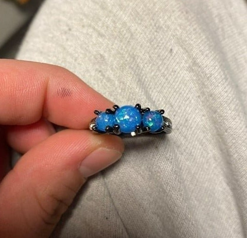 Round Blue Fire Opal 3 Stone Black Ring