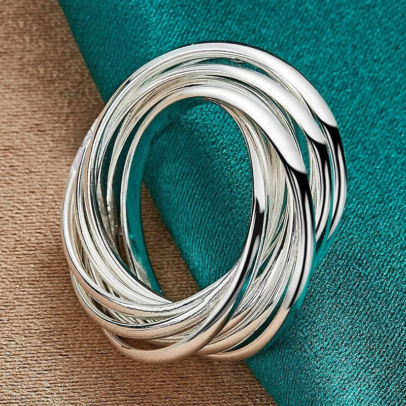 8 Overlapping Silver Spinner Anillos Ring