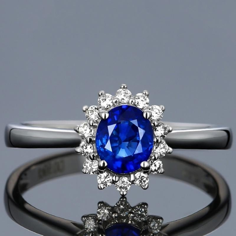 Sterling Silver Oval Blue Tanzanite Flower Open Ring