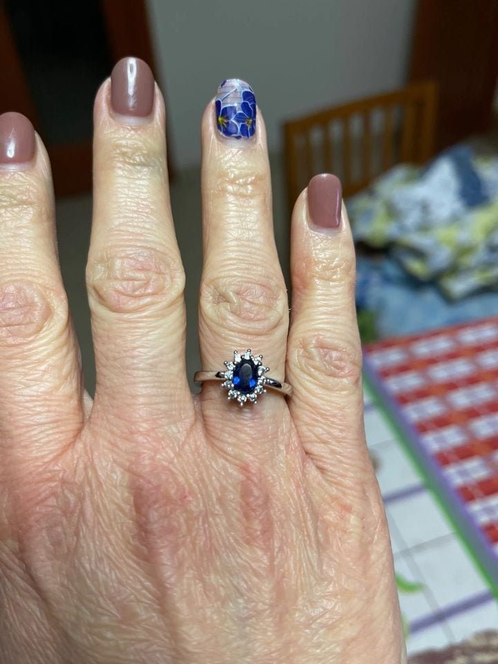 Sterling Silver Oval Blue Tanzanite Flower Open Ring