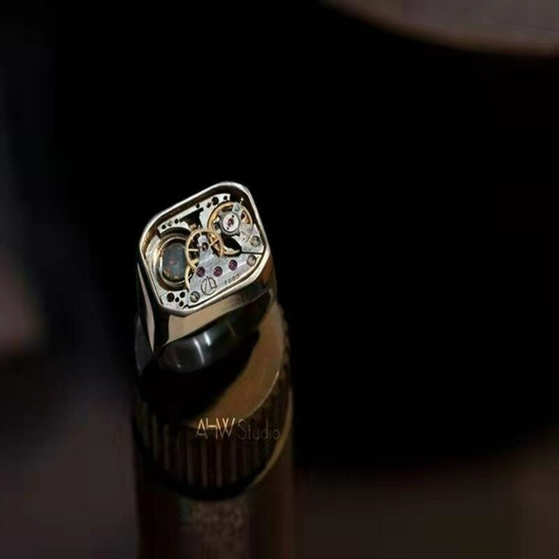 Fine Craftsmanship Mechanical Precision Gold Dial Silver Ring