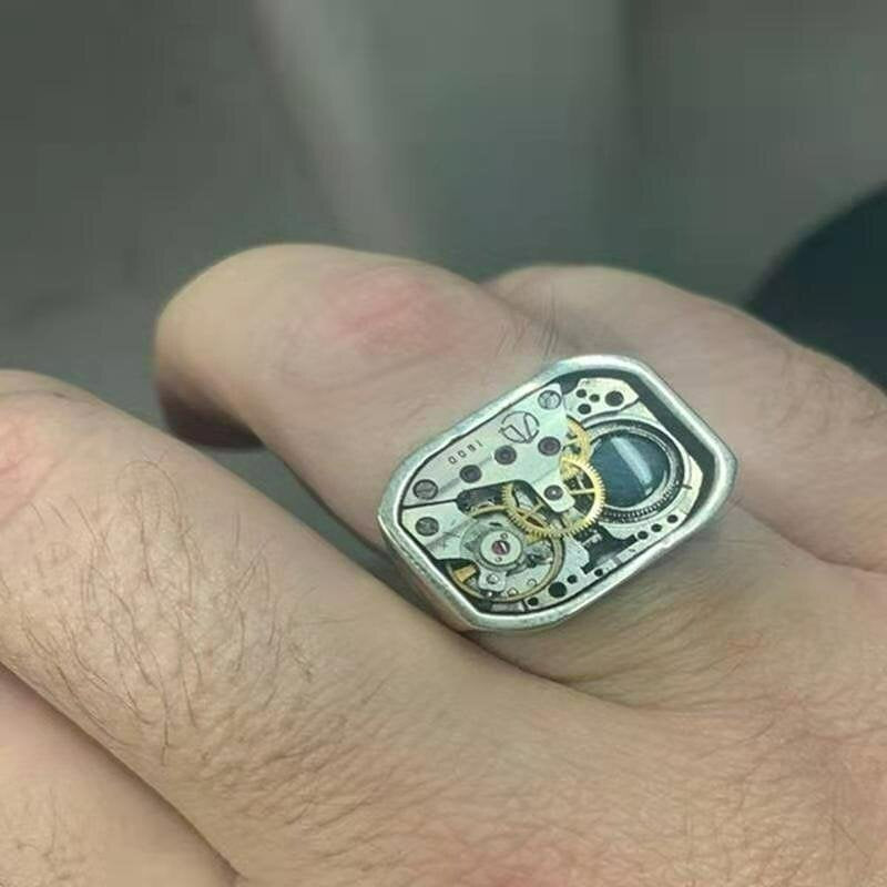 Fine Craftsmanship Mechanical Precision Gold Dial Silver Ring