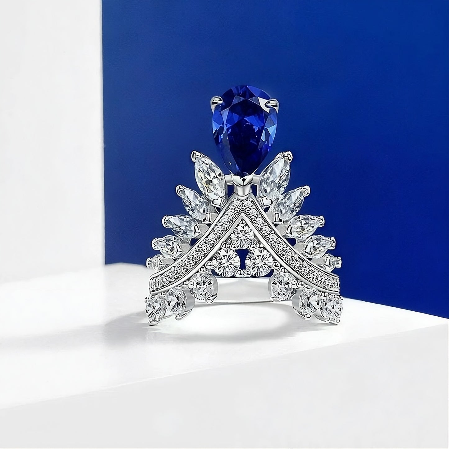 Blue Sapphire Pear Cut Crown Unique Silver Ring