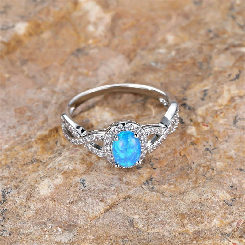Oval Cut Blue Opal & CZ Crystals Silver Halo Ring