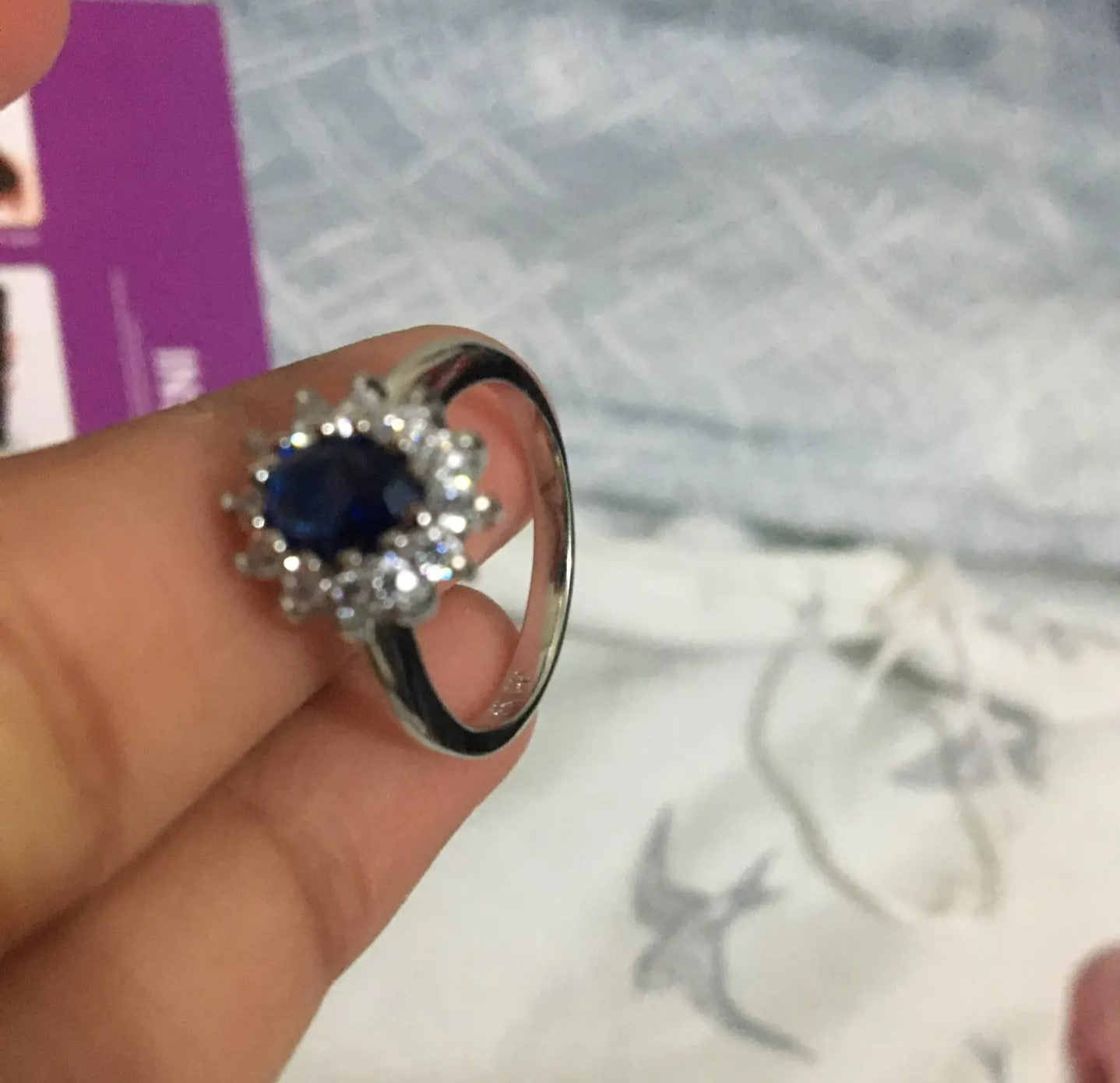 Sterling Silver Oval Blue Tanzanite Flower Open Ring