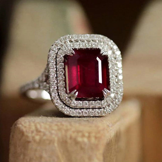 Emerald Cut Ruby Red Silver Halo Ring