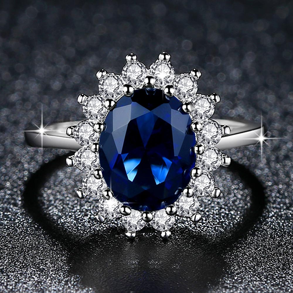 Sterling Silver Oval Blue Tanzanite Flower Open Ring