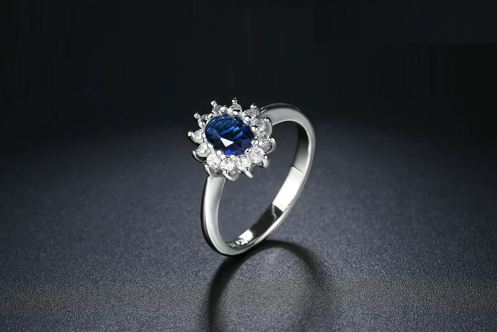 Sterling Silver Oval Blue Tanzanite Flower Open Ring