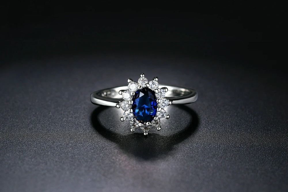 Sterling Silver Oval Blue Tanzanite Flower Open Ring