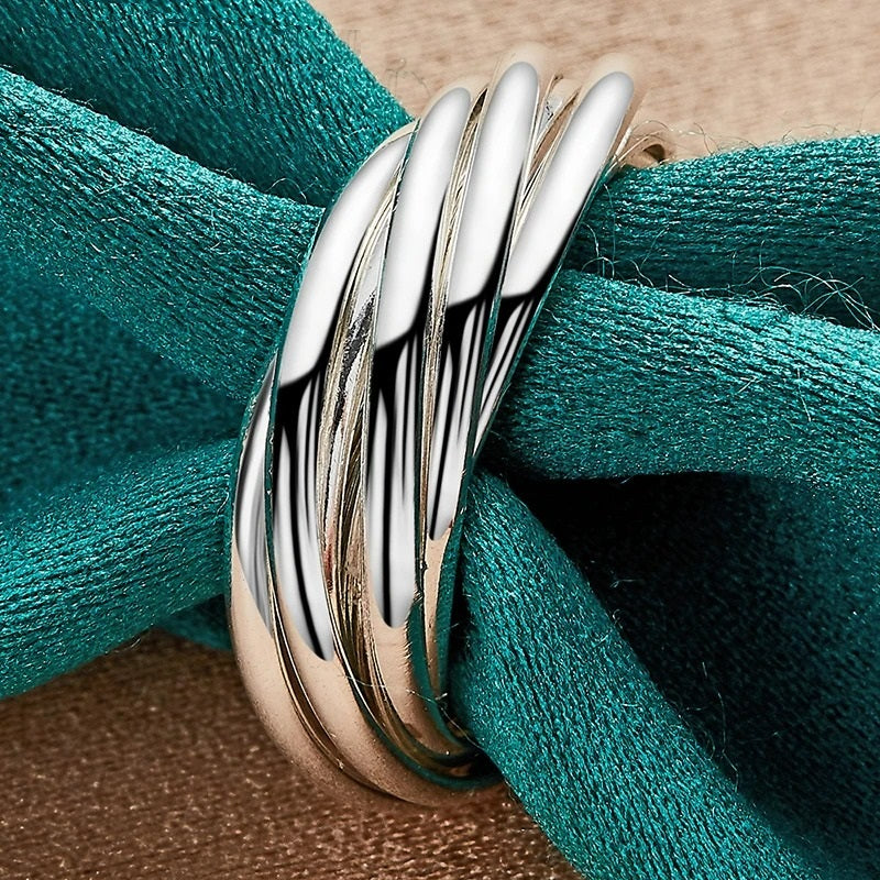 8 Overlapping Silver Spinner Anillos Ring