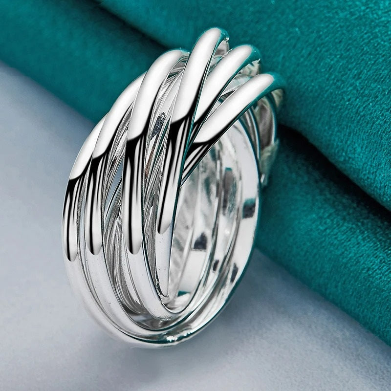 8 Overlapping Silver Spinner Anillos Ring