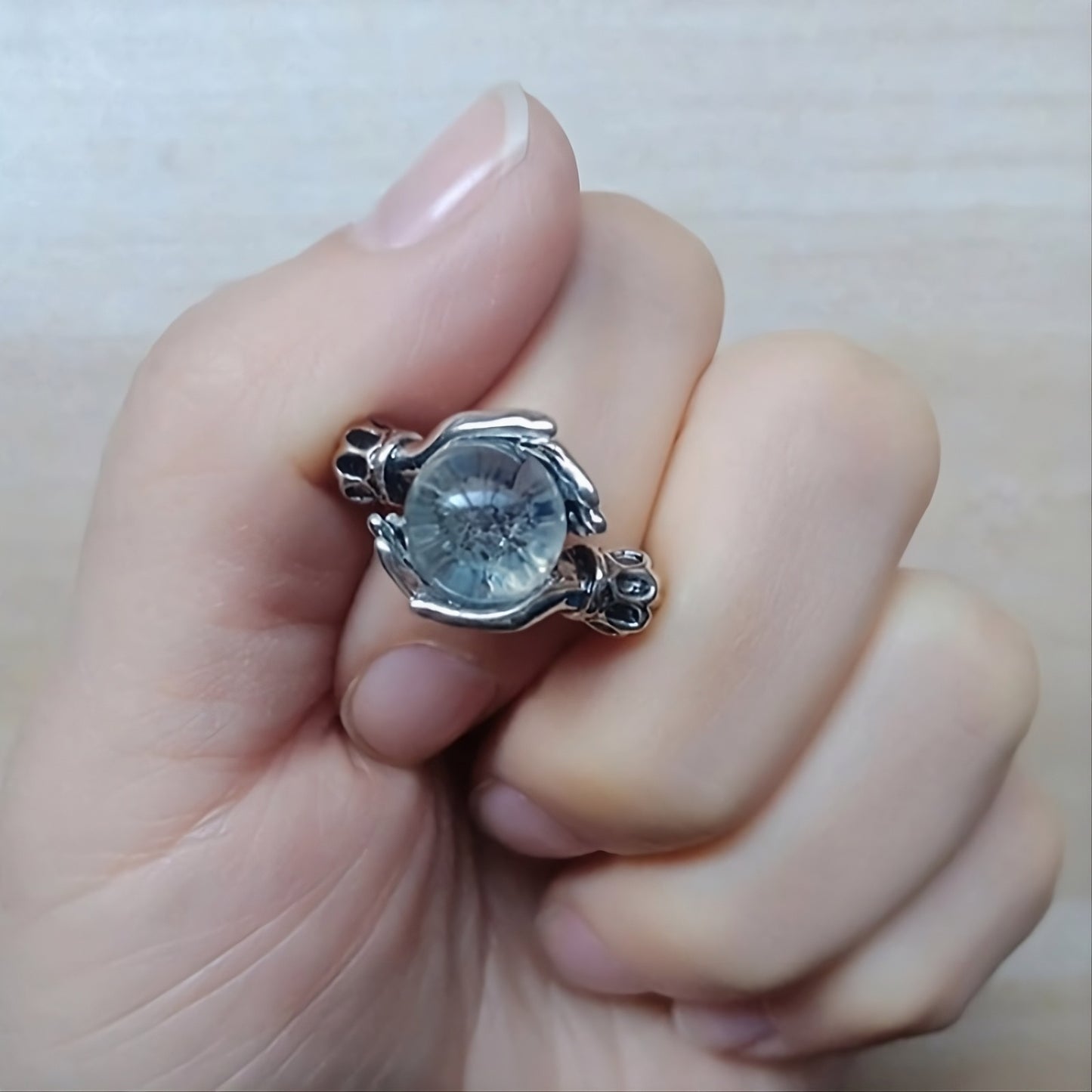 Retro Clear Marble Bead Hugging Hands Silver Ring